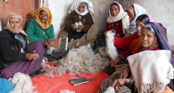 Older members of the Mandikini Women Weavers of Garhwal wash, scour and card local sheep wool