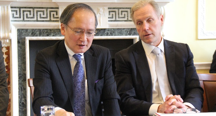 The Deputy Foreign Minister of Japan Yasumasa Nagamine, left, with CEO of Asia House Michael Lawrence, right