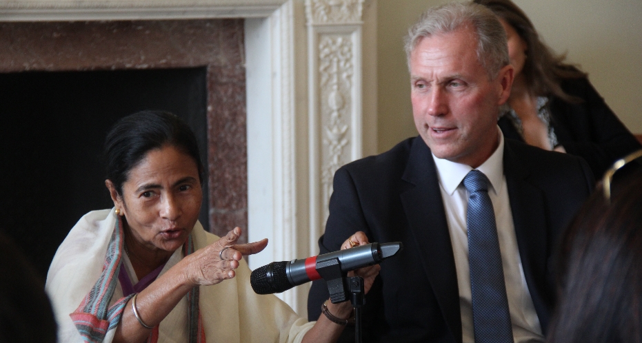 West Bengal Chief Minister Mamata Banerjee is pictured briefing Asia House corporate members, with CEO of Asia House Michael Lawrence, on her right