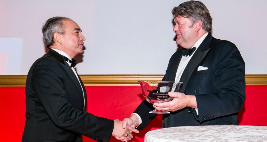 The Rt Hon. the Lord Strathclyde CH, Adviser, Battersea Power Station Development Company presents Nazir Razak with the Asian Business Leaders Award for 2015. Photo by Miles Willis