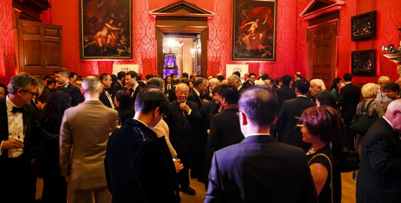 Guests mingled at Kensington Palace. Photo by Miles Willis