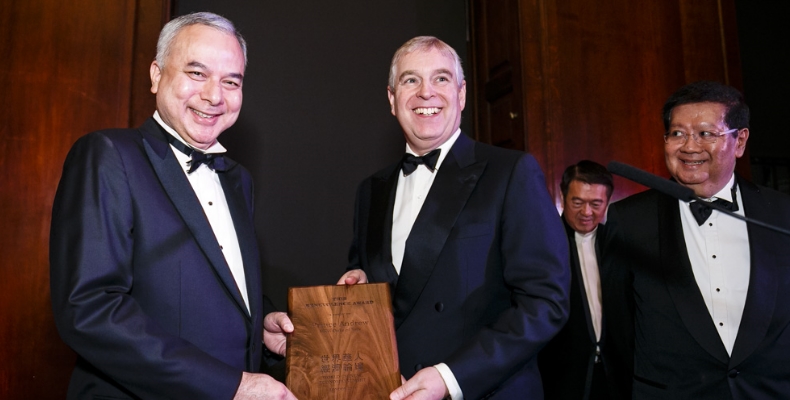 Prince Andrew receives the  Patron’s Special Benevolence Award from the Sultan of the state of Perak HRH Nazrin Muizzuddin Shah at Kensington Palace during the World Chinese Economic Summit. Photo by Miles Willis