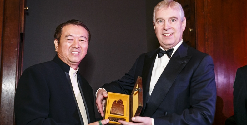 Prince Andrew is pictured with his award with Tan Sri Lee Kim Yew, Co-Founder & Patron of the World Chinese Economic Summit. Photo by Miles Willis