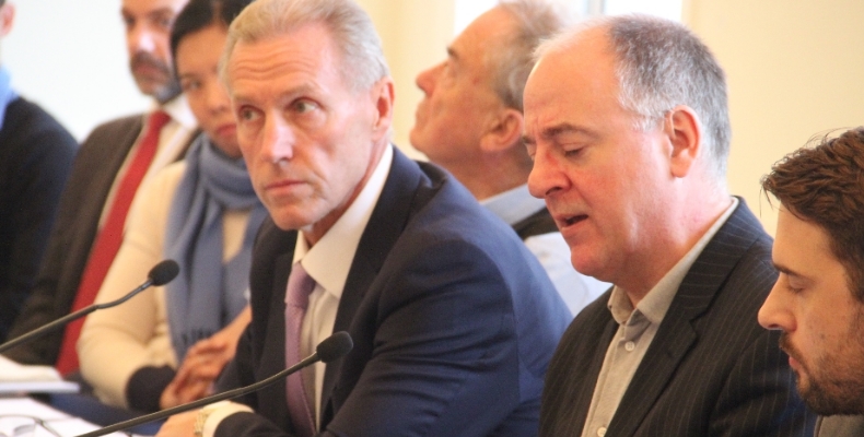 Chief Executive of Asia House Michael Lawrence is pictured next to Professor of Chinese Studies and Director of the Lau China Institute at King’s College in London Kerry Brown at the briefing